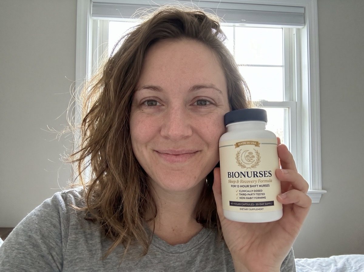 Jessica M., an ICU nurse, holding a bottle of BioNurses at home